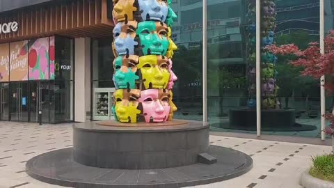 There is a sculpture in the shape of a bizarre human face. Is this really art?