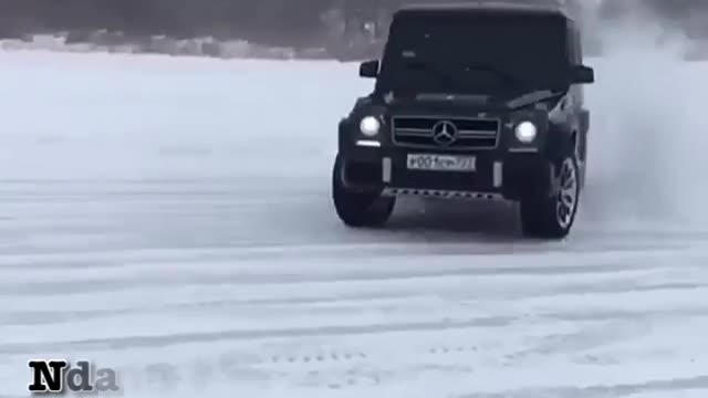 MERCEDES BENS DRIFTING ON SNOW