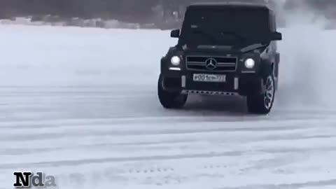 MERCEDES BENS DRIFTING ON SNOW