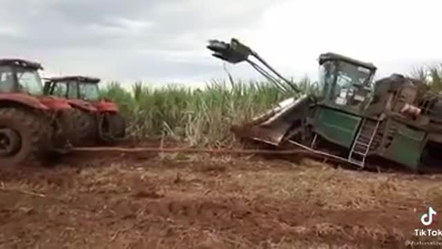 pulling jammed harvester