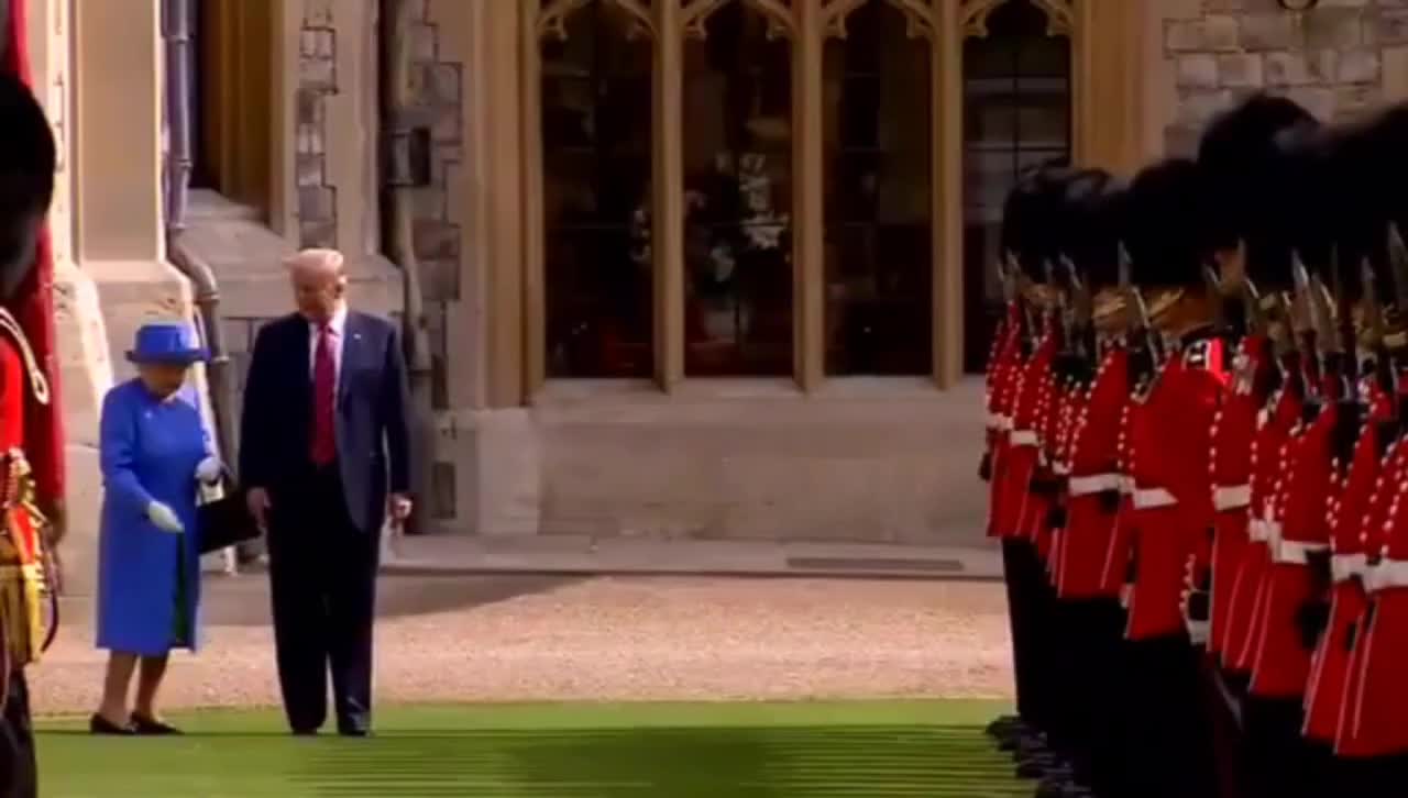 President Trump Walking In front Of Queen