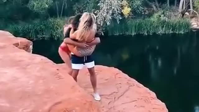 3 people doing awesome cliff Jumping