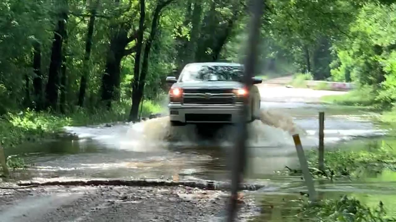 Truck Tries To Show Off Through Washout