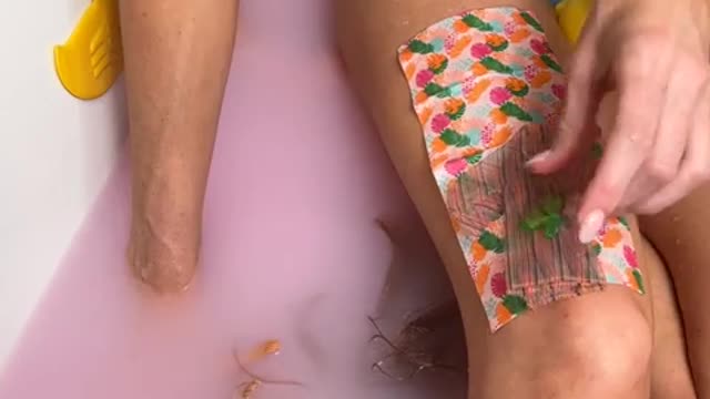 When she PULLS the Barbie out of the TUB