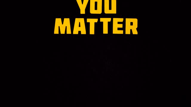You Matter Sign On Black Background
