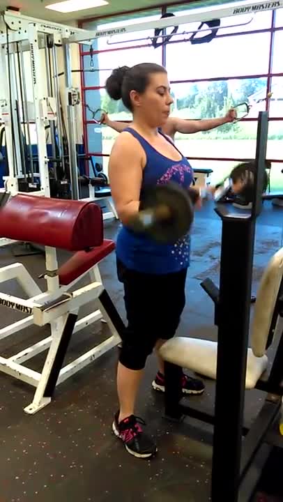 Pronated barbell curl female