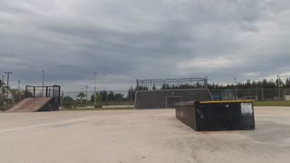 Redshirt skateboarder falls off ramp