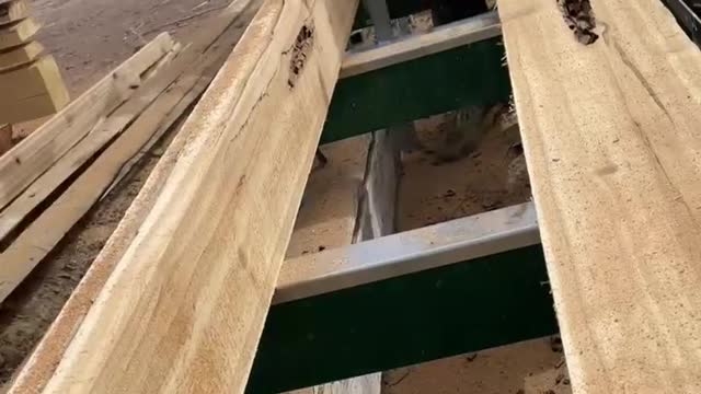 Cutting into an old pole with a rotten center.