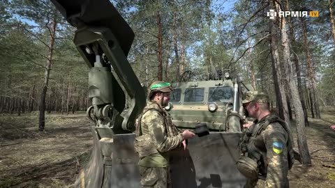 Ukrainians Using an Old Soviet Road Laying Heavy Engineering Vehicle