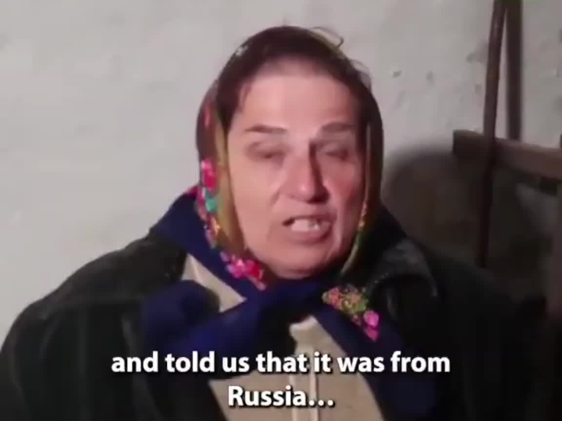 Ukrainian woman begs Russian troops not to withdraw