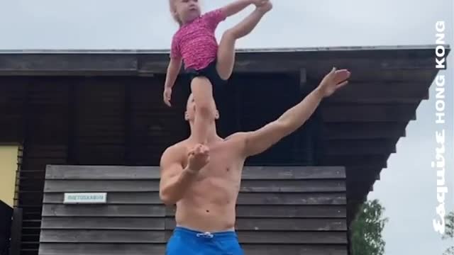 Daddy and baby love to showing their skills together