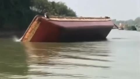 barge carrying material overturned