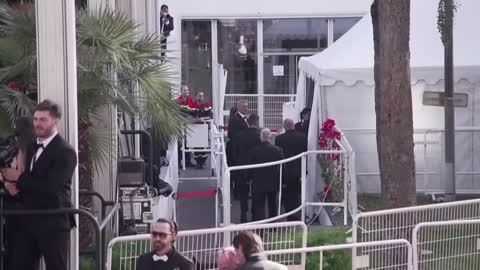 Pro-Ukraine protestor on the red carpet in Cannes