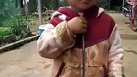 baby playing with the ground