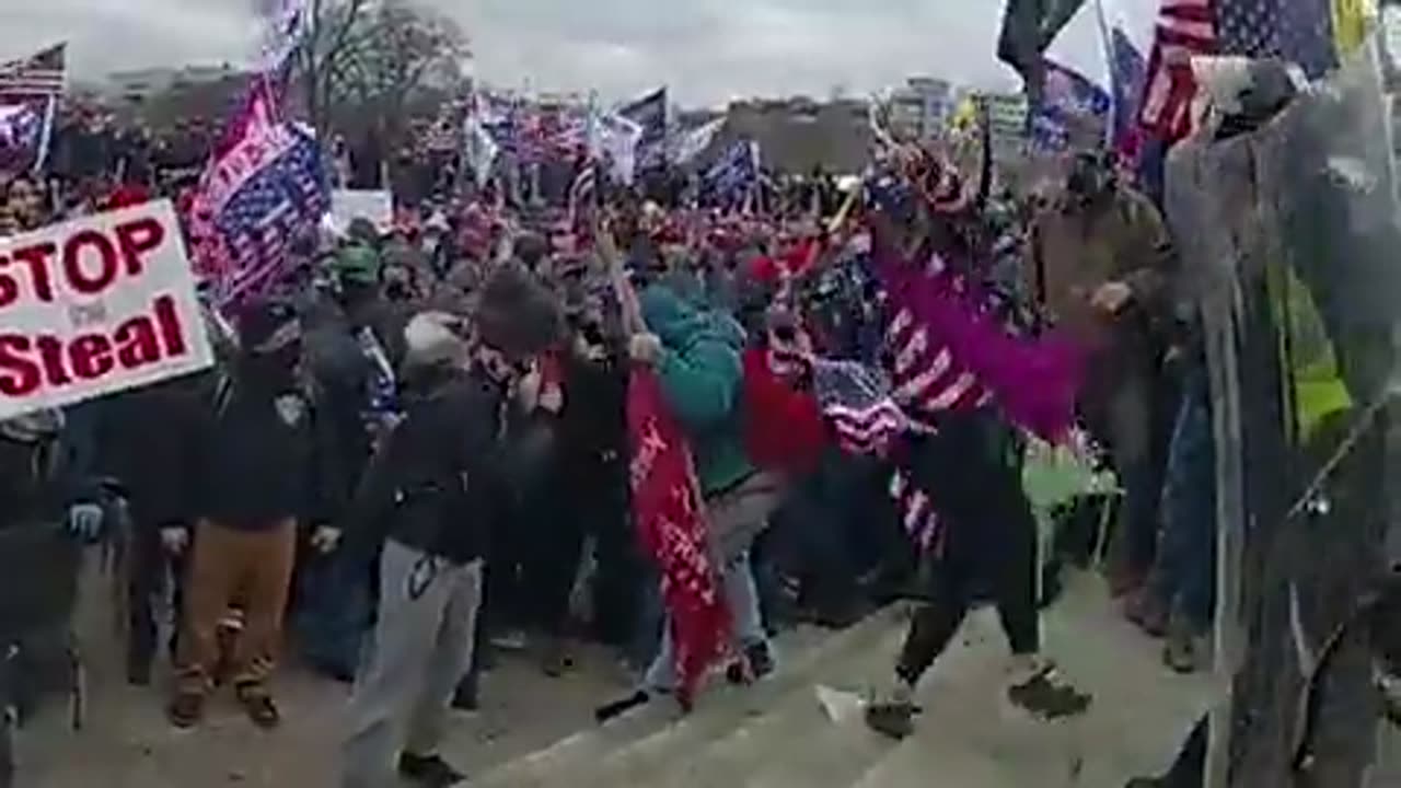 J6 footage emerges showing Capitol Police aggressively shove elderly woman down concrete stairs.