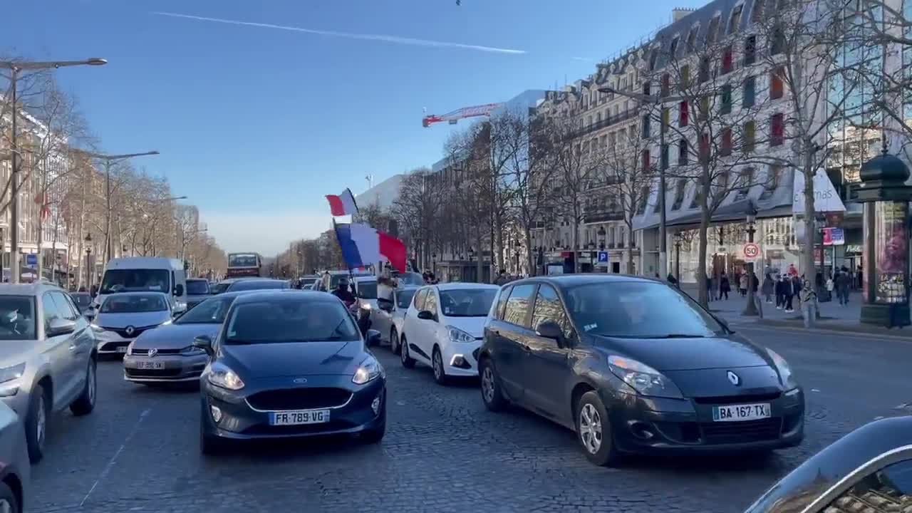 The convoy has reached the Champs Elysee, in north-western Paris.