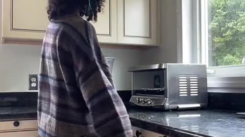 standing next to the counter I used to jump onto reach the cereal