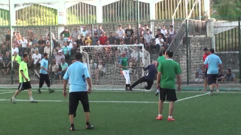 Old man playing football