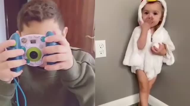 Funny A boy cleverly takes a photo of the girl
