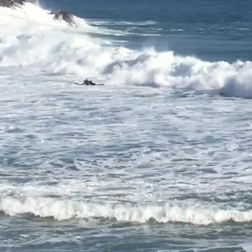 Surfer gets wiped out by huge wave