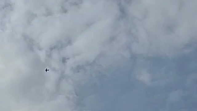 Watch the bright orb from behind the plane