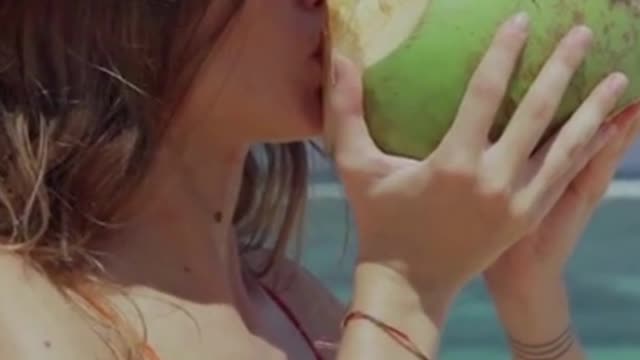 Girl drinking from a coconut #Shorts