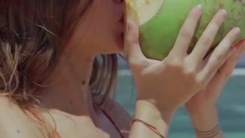 Girl drinking from a coconut #Shorts