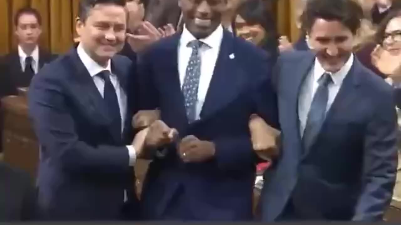 Trudeau gives a wink and bites his tongue at new Speaker of the House of Commons, Greg Fergus.