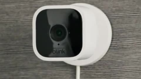 Compact indoor plug-in smart security camera