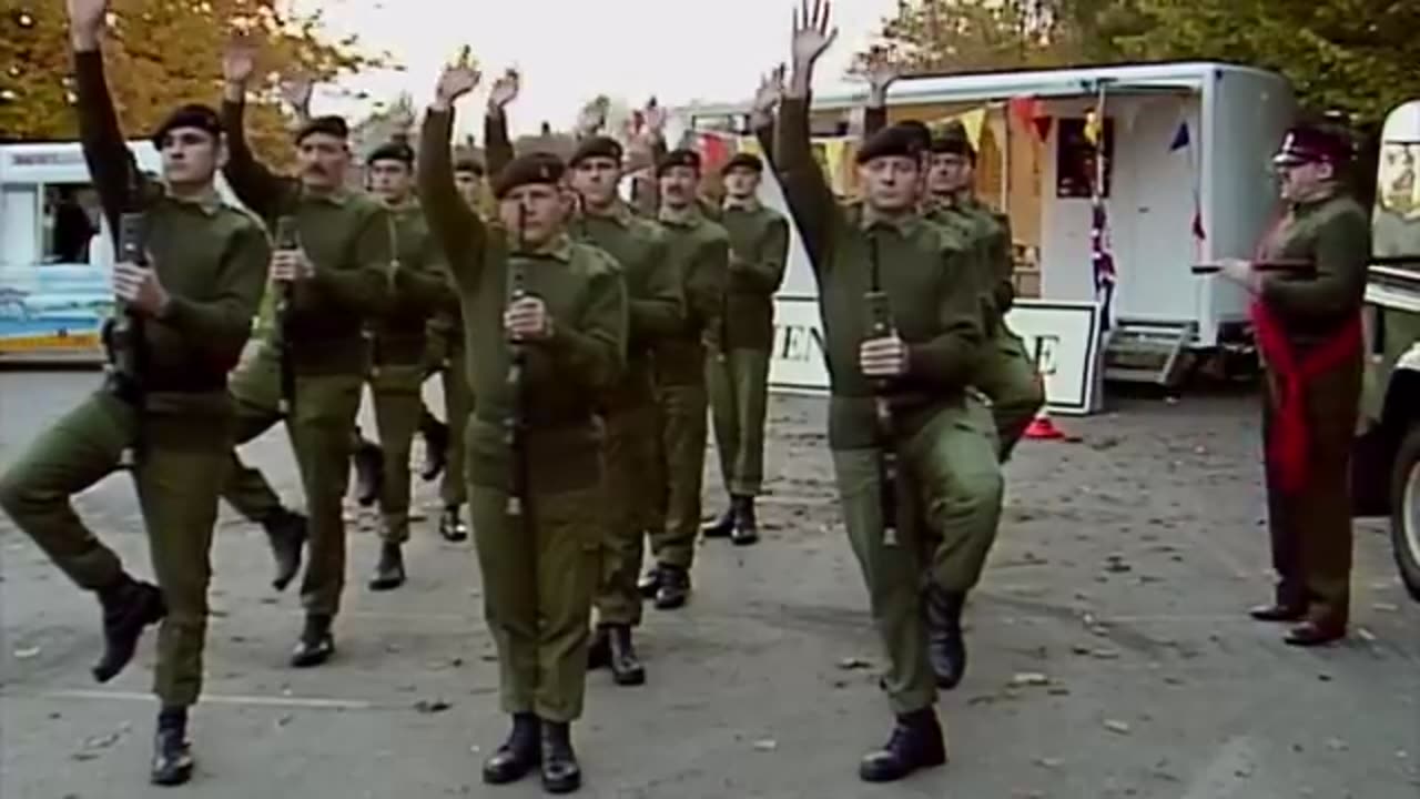 Mr Bean has fun shouting orders at some army personnel!