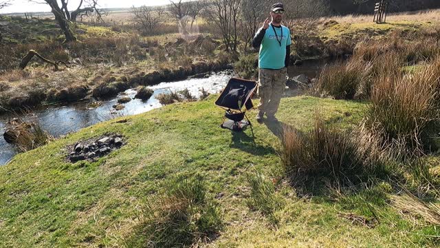 Position test before filming by a river.