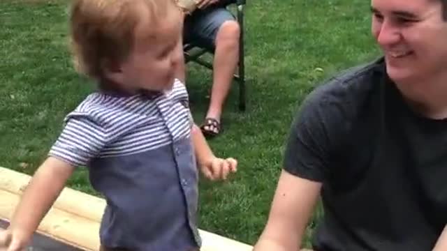 child scaring his father! very funny