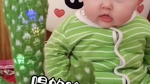 Babies play dancing cactus toy