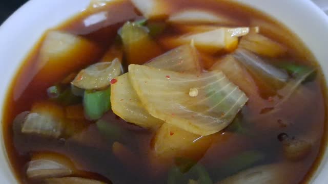 Red pepper powder, onions, and soy sauce with pepper.