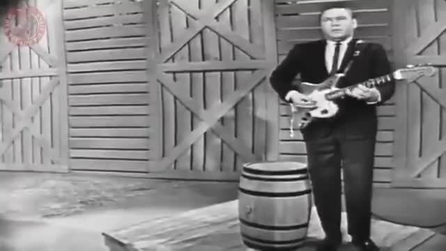 Roy Clark lighting it up.