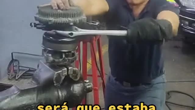 The mechanic removes the mechanical parts