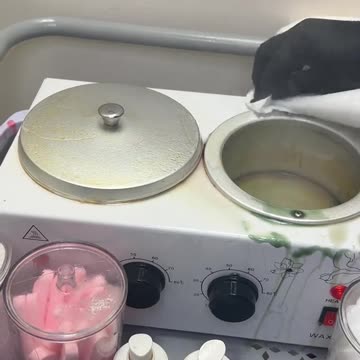 Experience the Art of Waxing: Melting Tickled Pink Premium Synthetic Hard Wax!