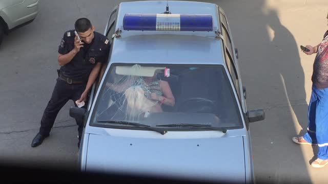 Drunk Woman Breaks Police Car Windshield with Bare Feet