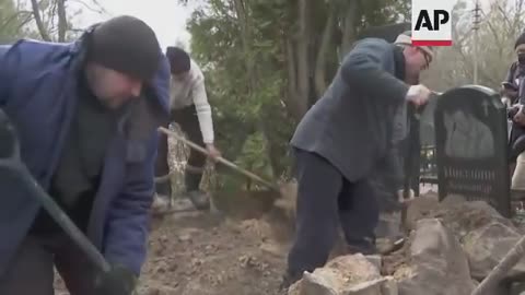 Ukrainian reservists buried their comrade