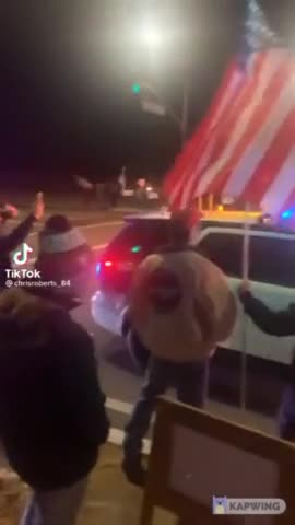 Proud American Law Enforcement Says "Let's Go Brandon" as He Drives By Trump Crowd