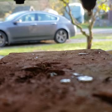 Pouring lead into a bullet mold.