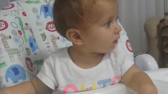 Baby headbangs while listening to the Iron Maiden \m/