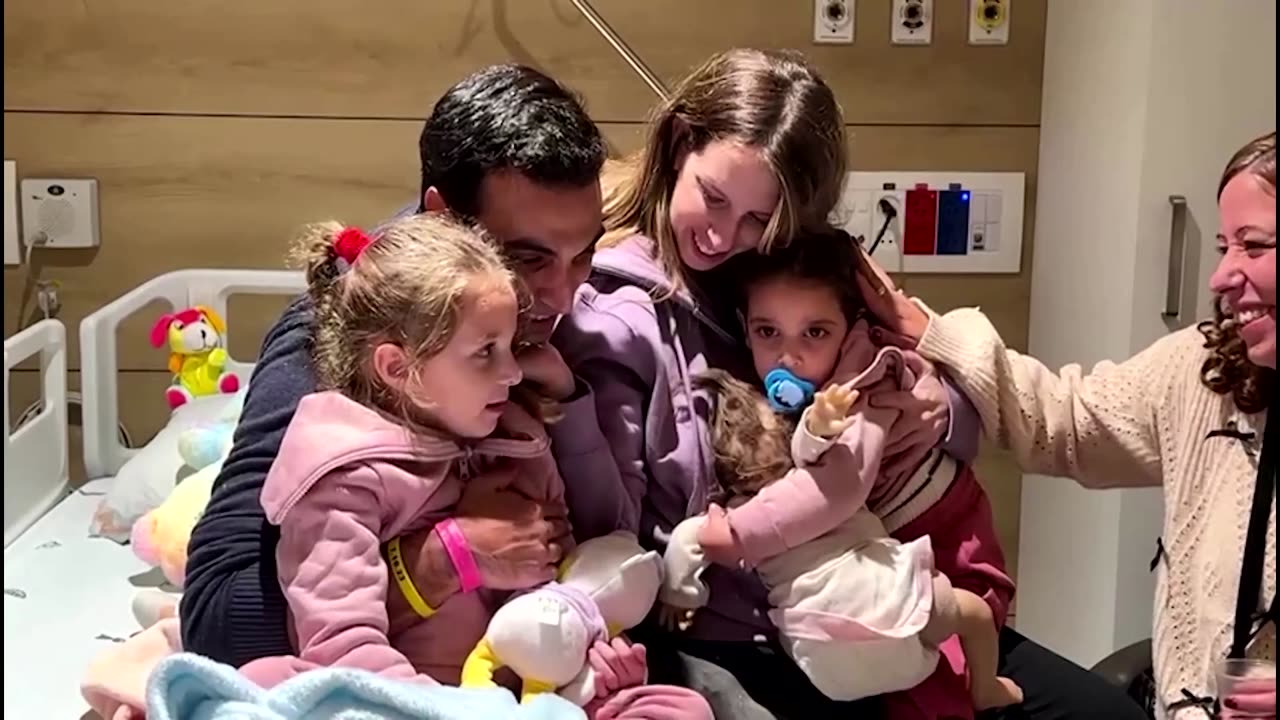 A young family reunites after Hamas' hostage release