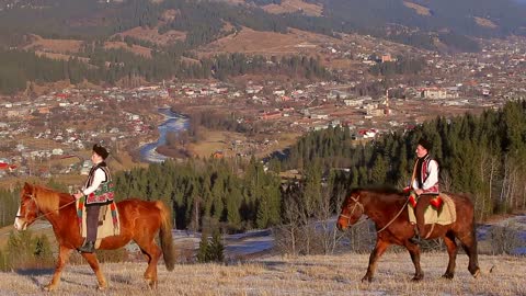 Gutsul go round the city on horses