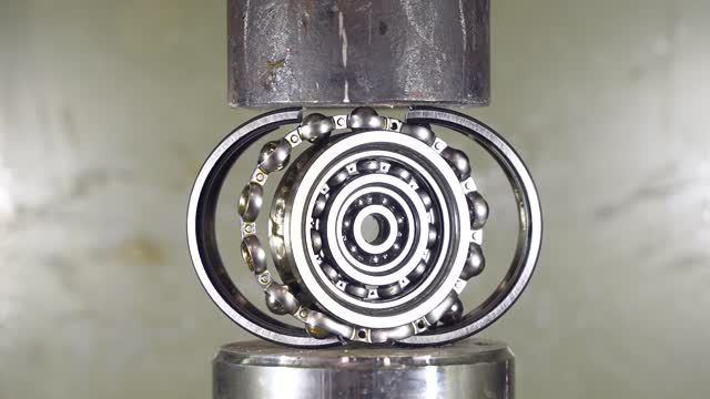 Crushing Multiple Ball Bearings with Hydraulic Press