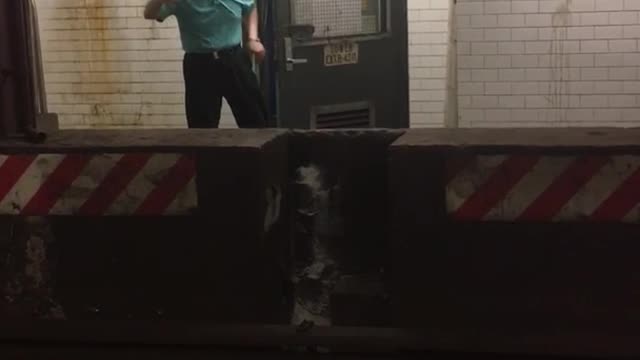 Old guy blue shirt subway yelling at people from across in door office