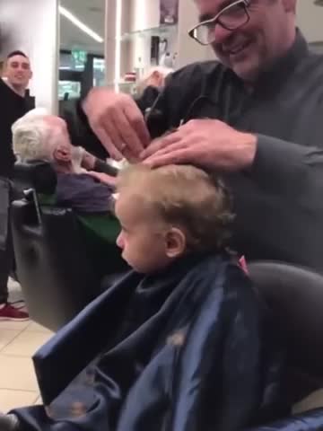 Barbers singalong beautifully for this kid