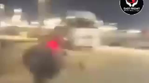 Israeli soldiers are running after a suicide drone attack by Hezbollah