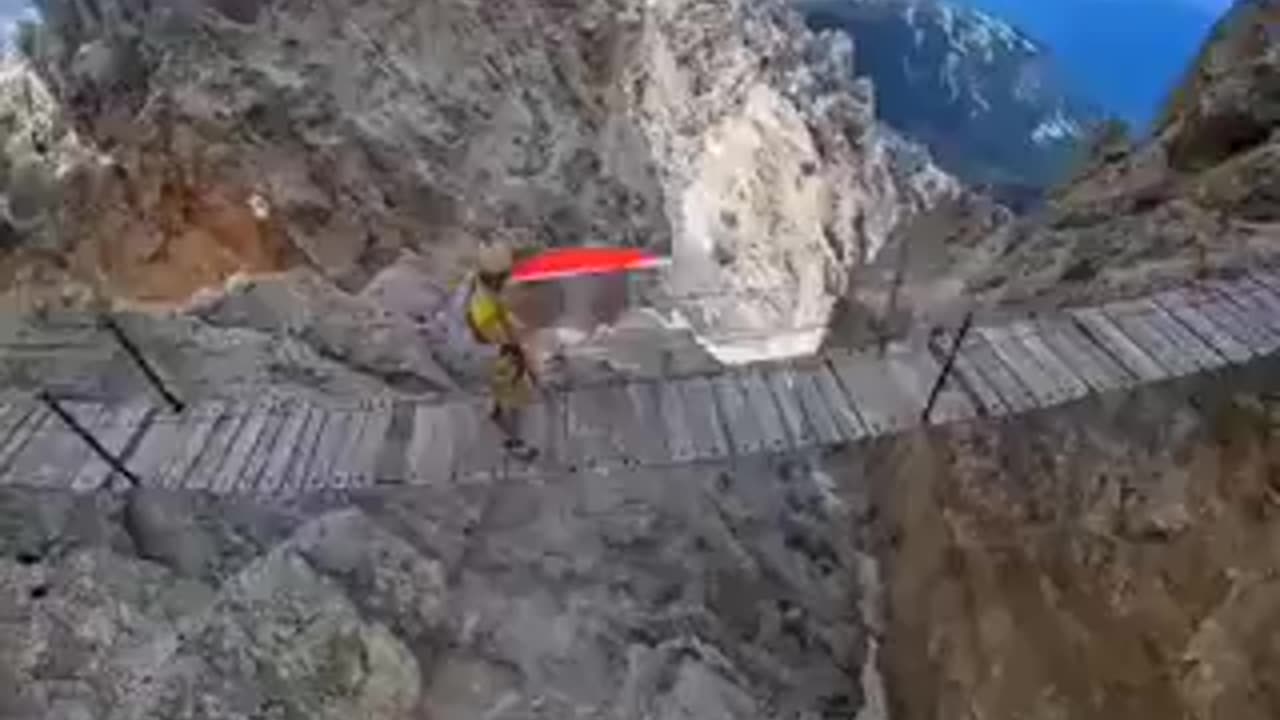 An Italian climber in solidarity with Palestine in the breathtaking Dolomites mountain range