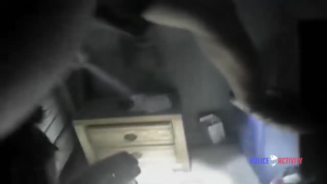 Police Bodycam Shows Suspect Hiding Inside Hollow Dresser